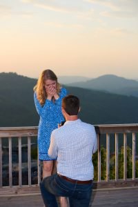 Robinson Engagement Photo at McCloud Mountain. The moment of proposing.