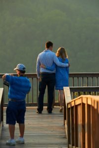 Robinson Engagement Photo at McCloud Mountain. Photographer Dwayne Hickson preparing to do the photography.