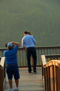 Robinson Engagement Photo at McCloud Mountain. Photographer Dwayne Hickson photographing event.