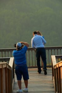 Robinson Engagement Photo at McCloud Mountain. Photographer Dwayne Hickson photographing event.