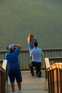 Robinson Engagement Photo at McCloud Mountain. Photographer Dwayne Hickson photographing the question. "Will You Marry Me"