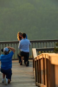 Robinson Engagement Photo at McCloud Mountain. Photographer Dwayne Hickson photographing the question. "Will You Marry Me"