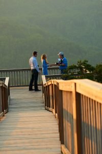 Robinson Engagement Photo at McCloud Mountain. Meeting with the bridge after doing the photography.