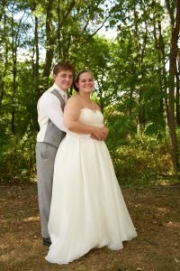 Dallas and Taylor Wedding. Taylor Hugging Dallas.
